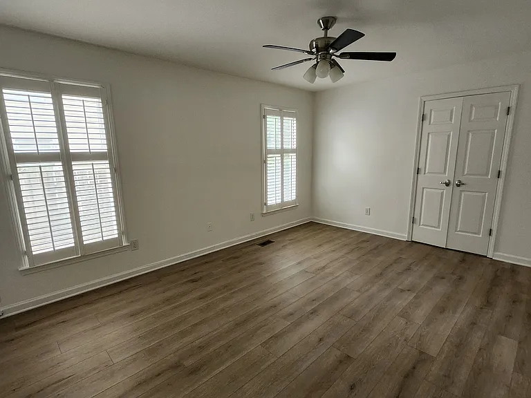 Master bedroom with large windows