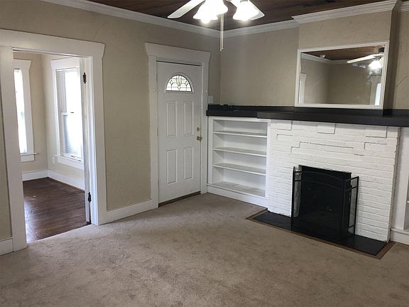 Entry into living room with office