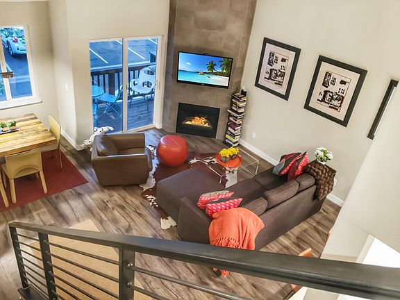 Living room with fireplace and smart tv