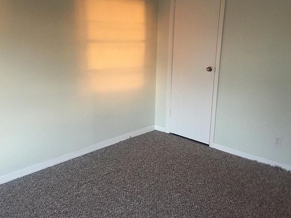 Coat closet in living room.