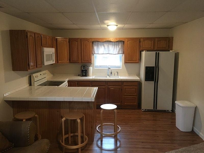 KItchen includes refridgerator, electric full size stove/ove