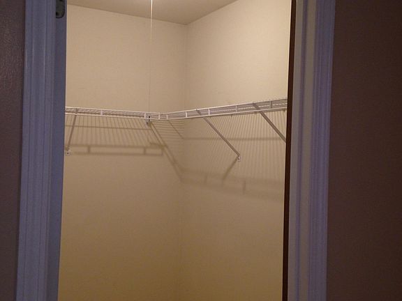 Walk-in closet in secondary bedroom