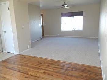 Living room and hard wood dining area
