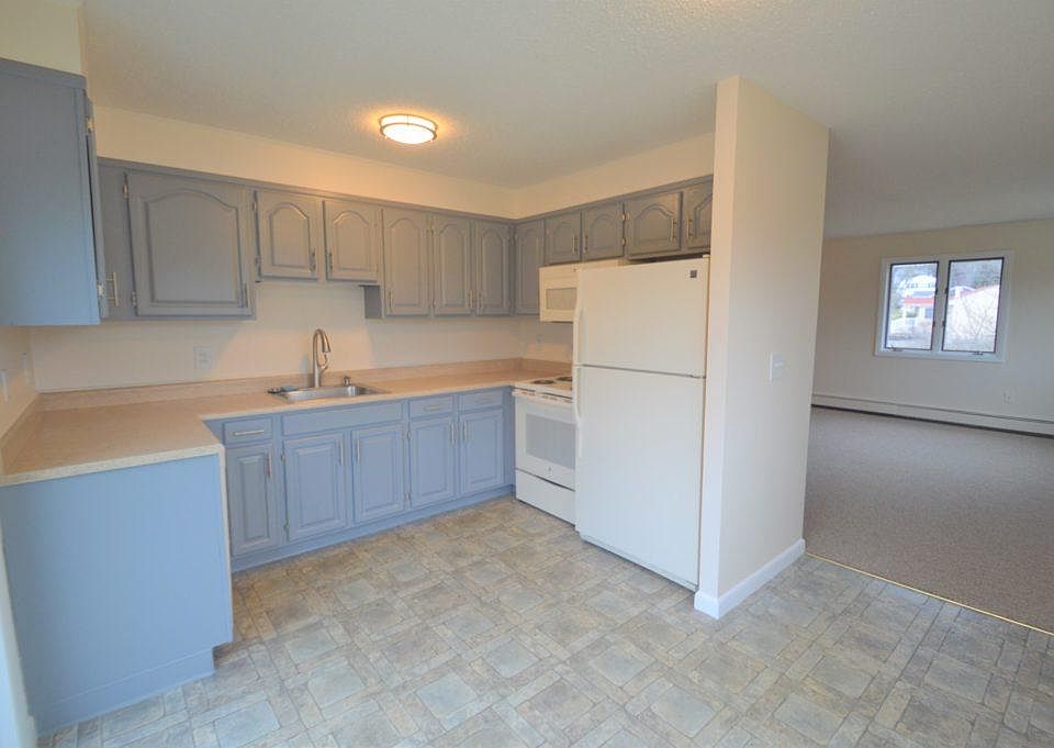Semi-open to the living room. Eat in kitchen with dishwasher.