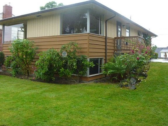 Welcome home! Custom built, one owner home with pride of ownership. Very well maintained over the years and recent new sheetrock work finished 60% of the basement. New concrete work includes patio, walkway, steps and off street parking area off paved alley.