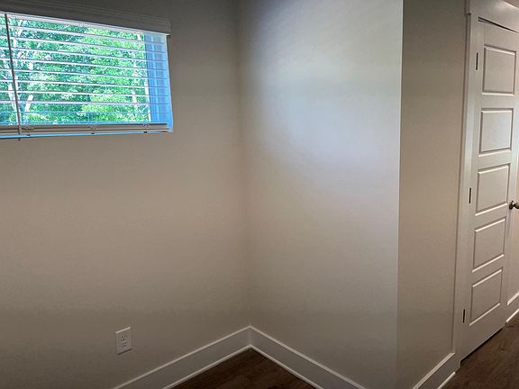 other view of nook and door of main floor half bath