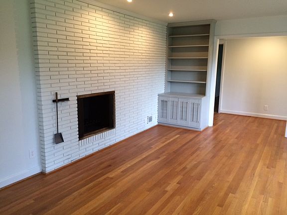 One of three fireplaces is in the living room
