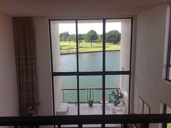 2nd image of 9120 W Bay Harbor Dr APT 2B