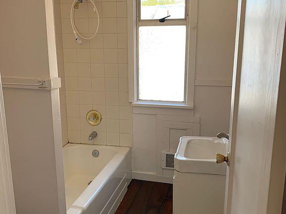 Bathroom. Laundry is located in secret room behind the sink.