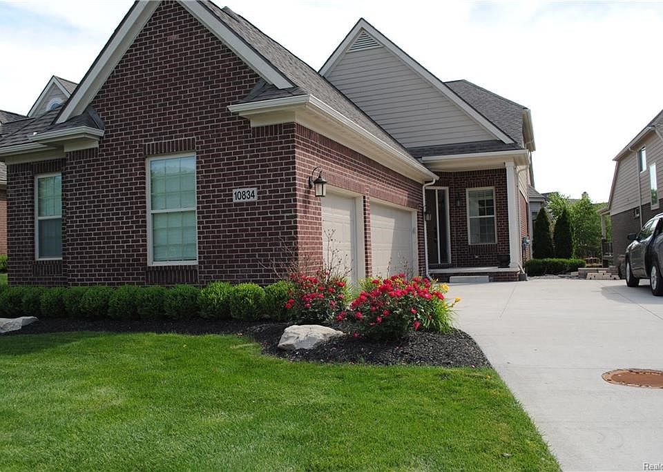An amazing home on secluded, private all-sports Hidden Lake!