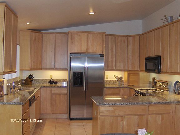 Incredable kitchen with honey maple cabinets and lots of whistles