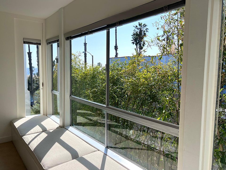 Everyone's favorite lounging spot to enjoy side views of the ocean and beach. (Bamboo has been trimmed since photo to enhance the views!)