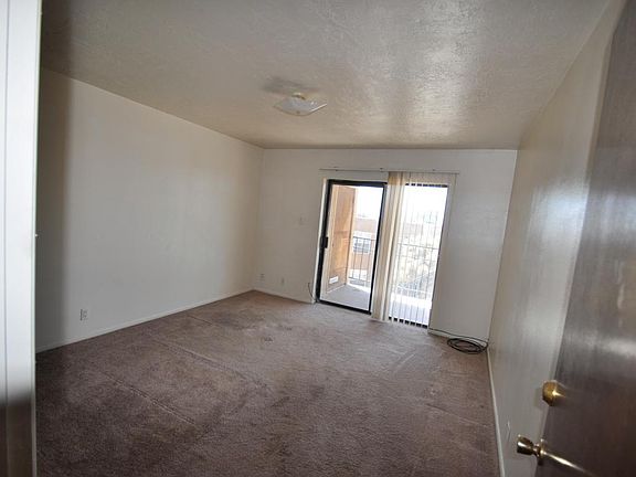 Bedroom one towards patio.dr