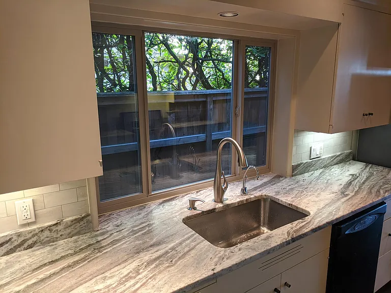 New window, sink, faucet, countertops, & backsplash