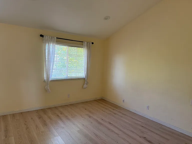 Master bedroom with new wooden flooring
