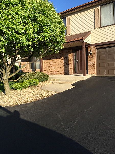 Front outside w/attached garage