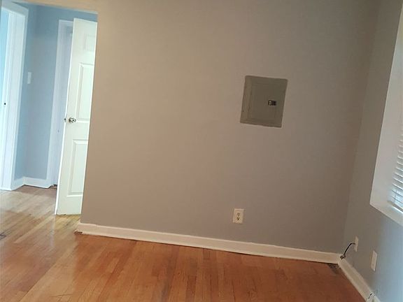 Looking from kitchen towards front door.