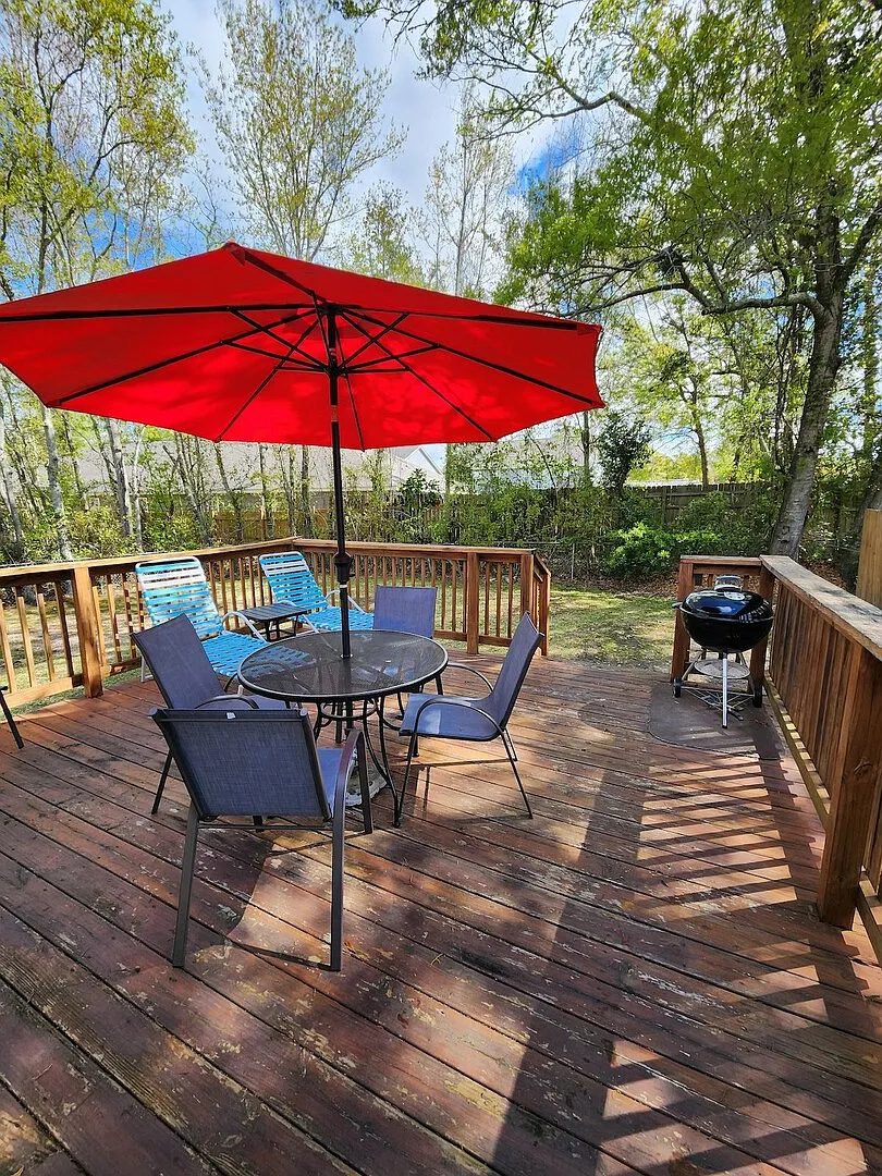 Coastal Home with Fenced Backyard — Photo 4