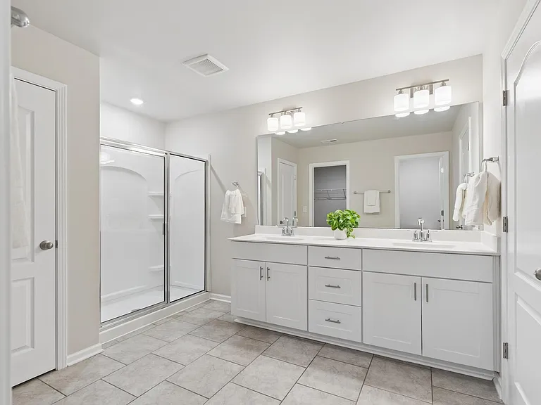 Master Bath with Double Vanity, Shower, Walk in closet and Linen closet ready to move in