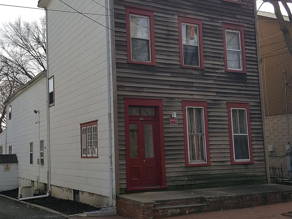 Front entrance and driveway to private off street parking
