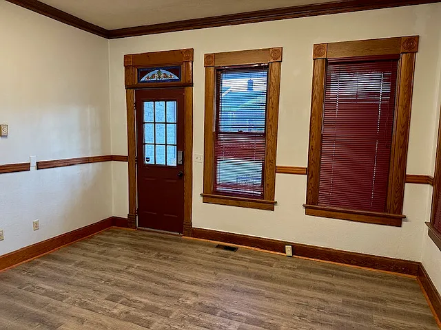 Tall ceilings and all new vinyl plank flooring throughout.
