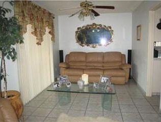 a bonus room, that functions as a second den or formal dining room