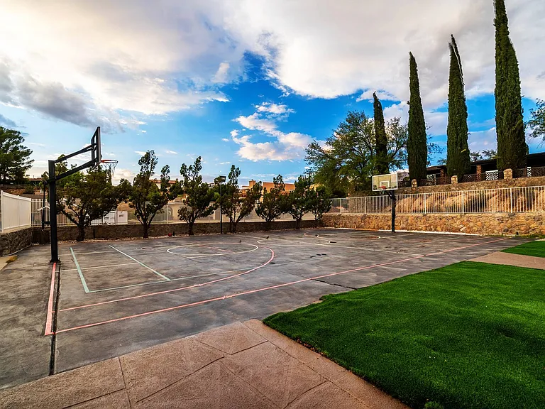 Full size basketball court with metal nets