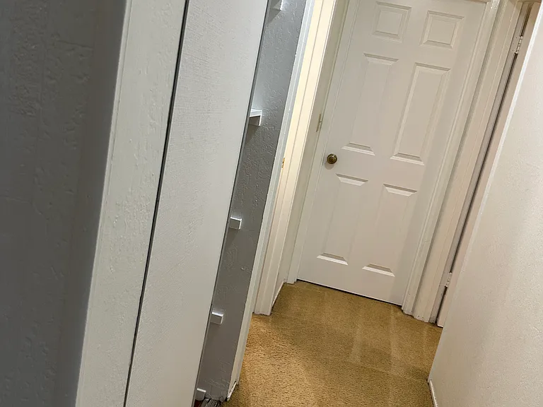 Your private hallway to both your bedrooms, hall closet and your private bath