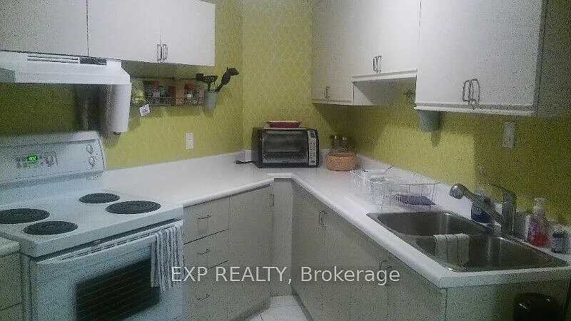 Building Photo - 31 Matterdale Ave #L