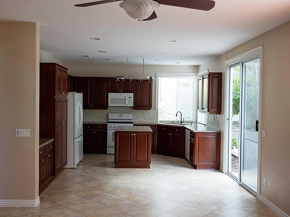 Kitchen and sliding door to covered patio