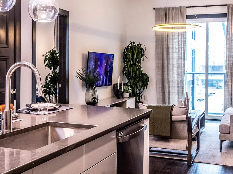 Floor-to-ceiling windows provide ample natural light.