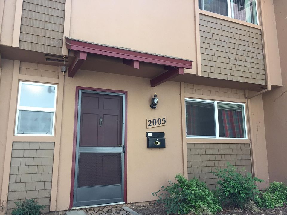 A view of the front. There is a faucet for a hose.