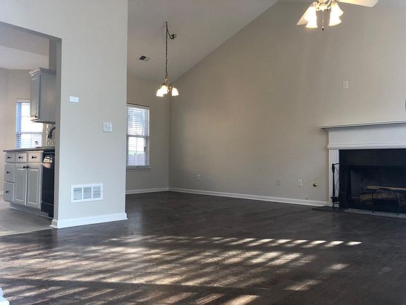 View from foyer looking to living room and dining room