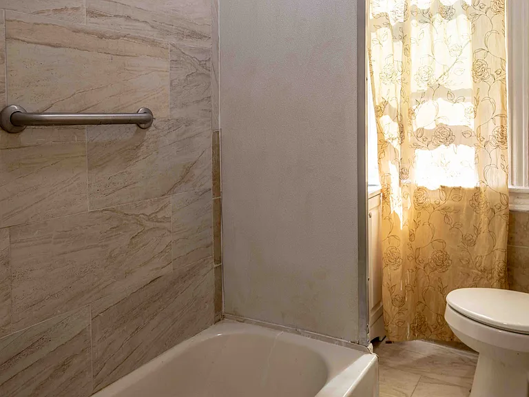 5809 Delancey St — Photo 10