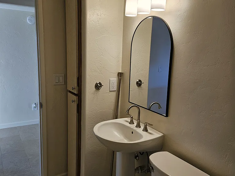 Guest Bathroom showing Cabinets