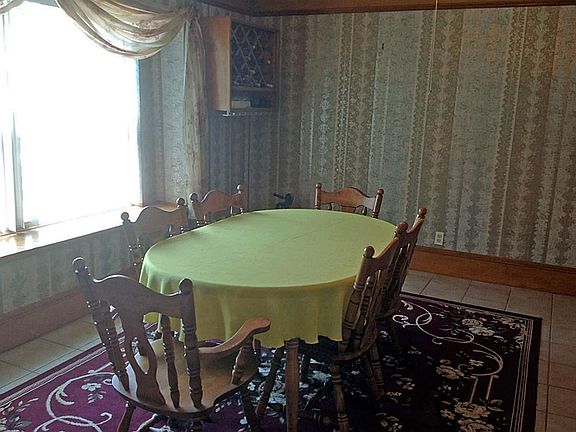 Formal dining room - built in cabinet in corner