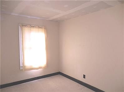 Kitchen has lots of cabinets, counter space, light (4 windows), and all appliances stay!