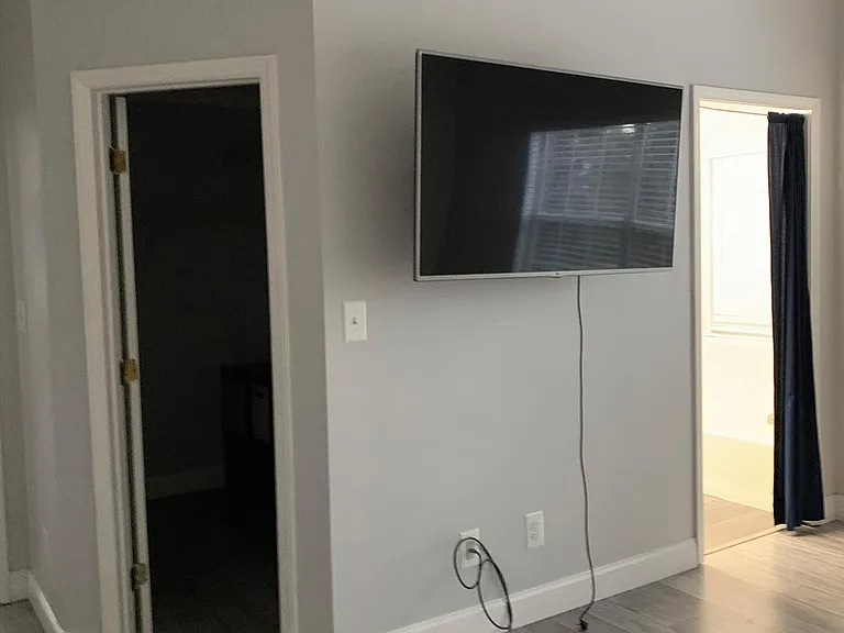 Master bedroom walk in closet and bathroom doorway