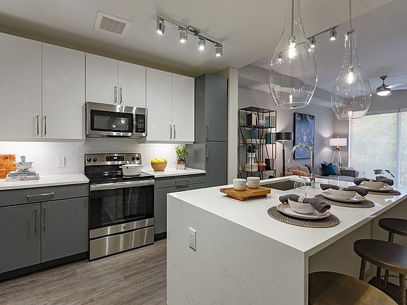 Kitchen Islands with Waterfall Vicostone Marble-Effect Quartz Countertops (St. Arnold A Floorplan)