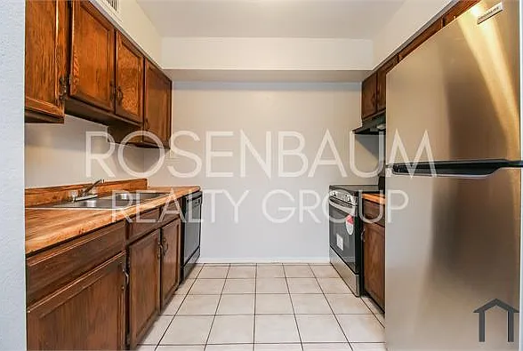 1050 W University Dr #201 — Photo 1
