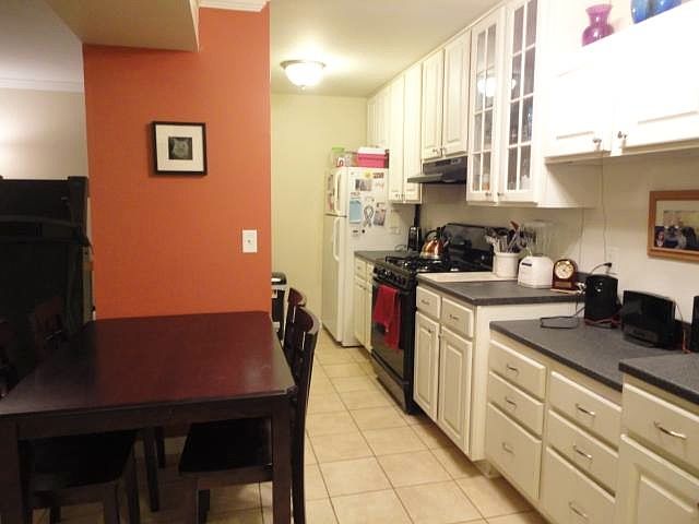 Kitchen includes NEW stove and range hood