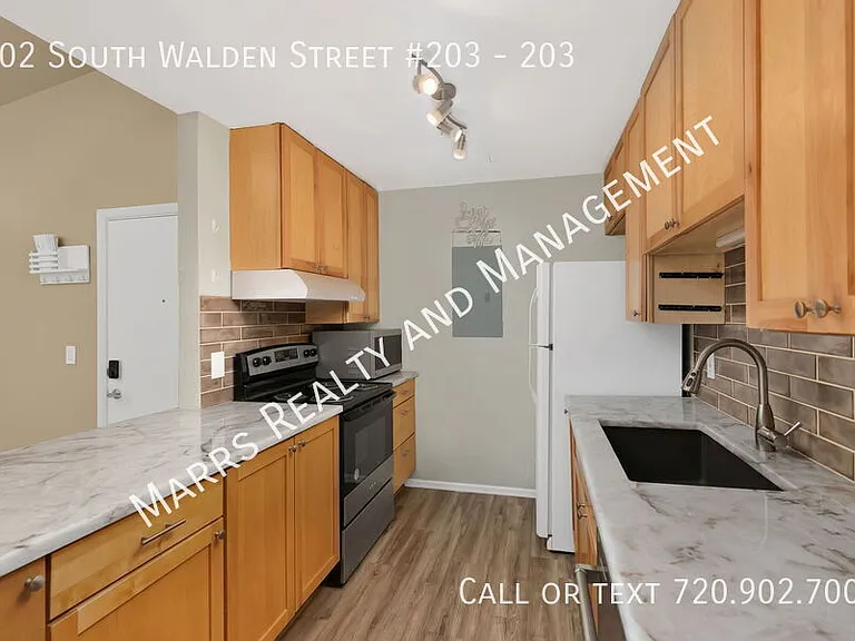 902 S Walden St #203 — Photo 2