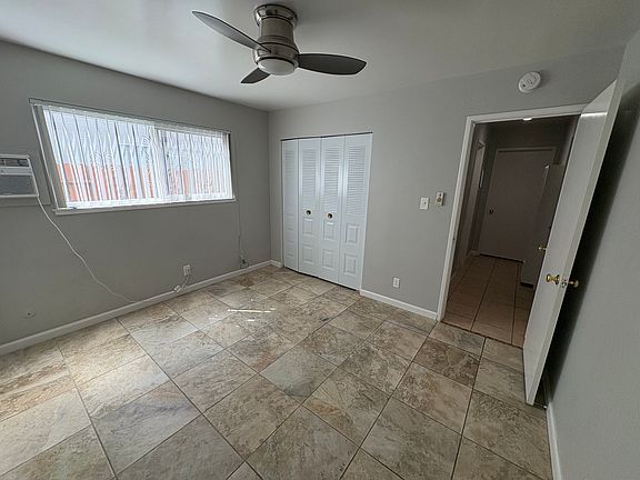 Second bedroom with contemporary tile