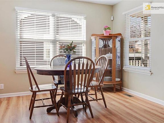 Dining area filled with tons of light coming in from new windows!