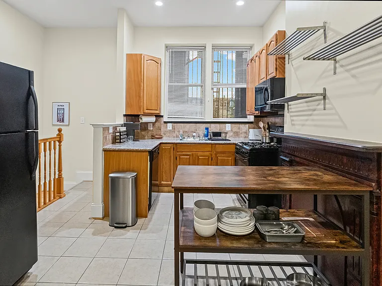 Kitchen with all the essentials to cook a delicious meal while feeling connected to dining & living room.
