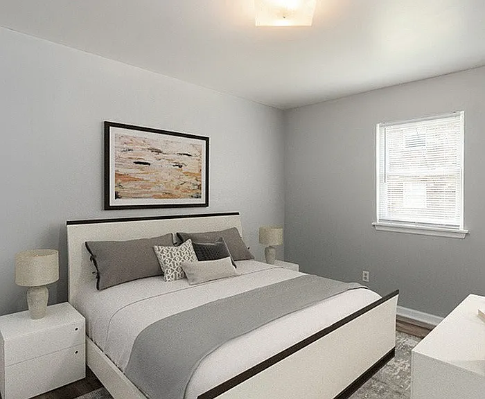 Experience tranquility in this beautifully designed master bedroom, perfect for relaxation.