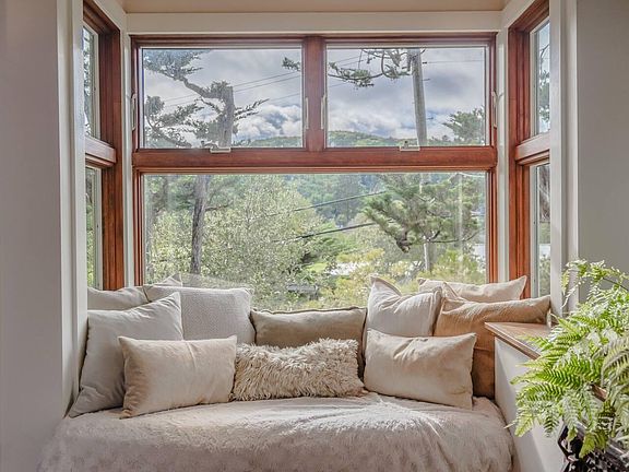 Warm, cosy nook in Great Room for reading while overlooking the Zen garden with peaceful waterfall
