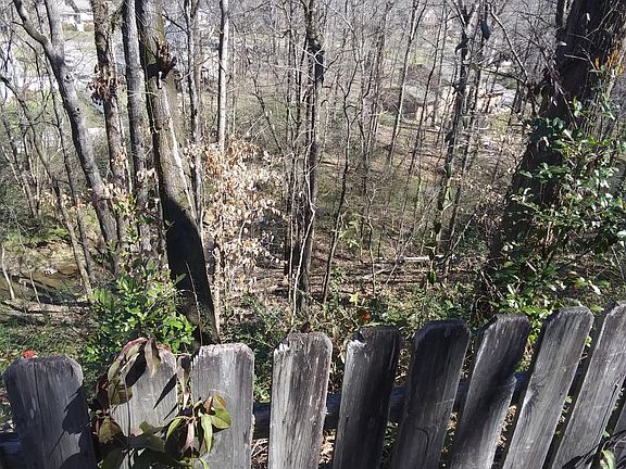 Lot is large with lots of woods, so its quiet.