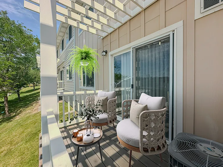 Liberty Hill Apartments, Draper, Utah, A patio with a table, chairs, and a potted plant.