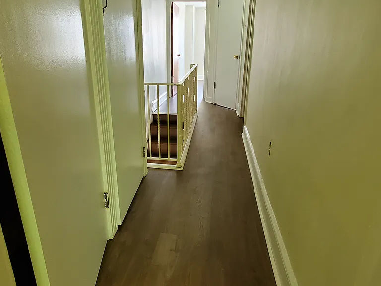 hall with linen/storage closets